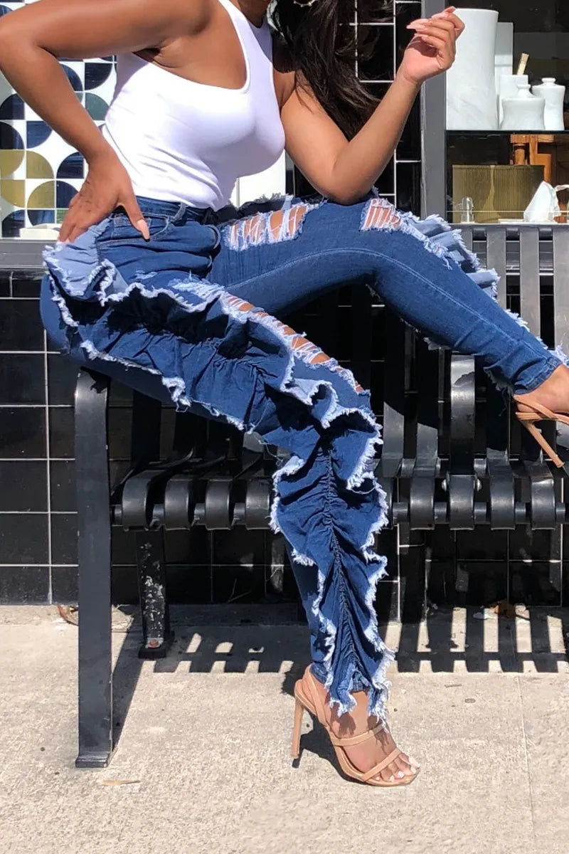 Women's Distressed Skinny Jeans With Asymmetrical Hem