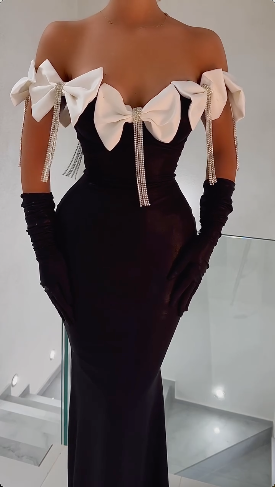 Glamorous Black Off-Shoulder Velvet Mermaid Maxi Dress with White Crystal Bow Details