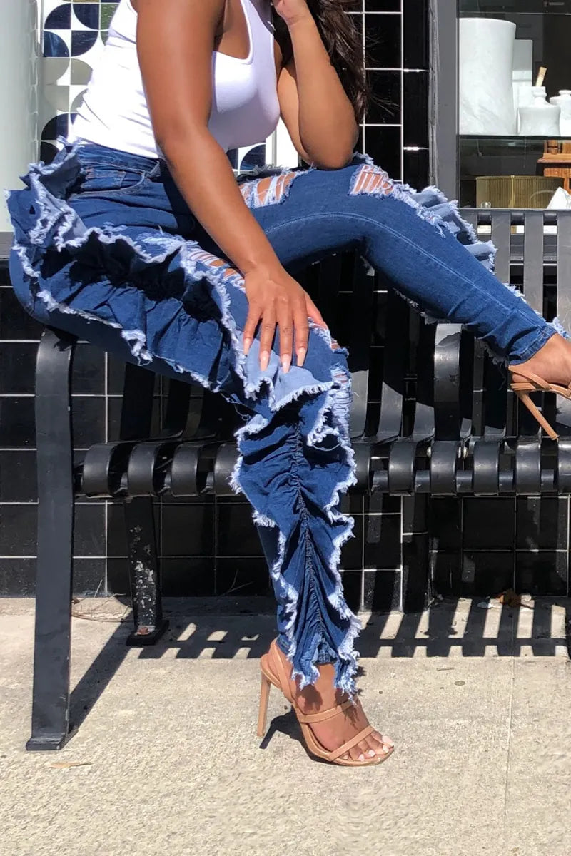 Women's Distressed Skinny Jeans With Asymmetrical Hem