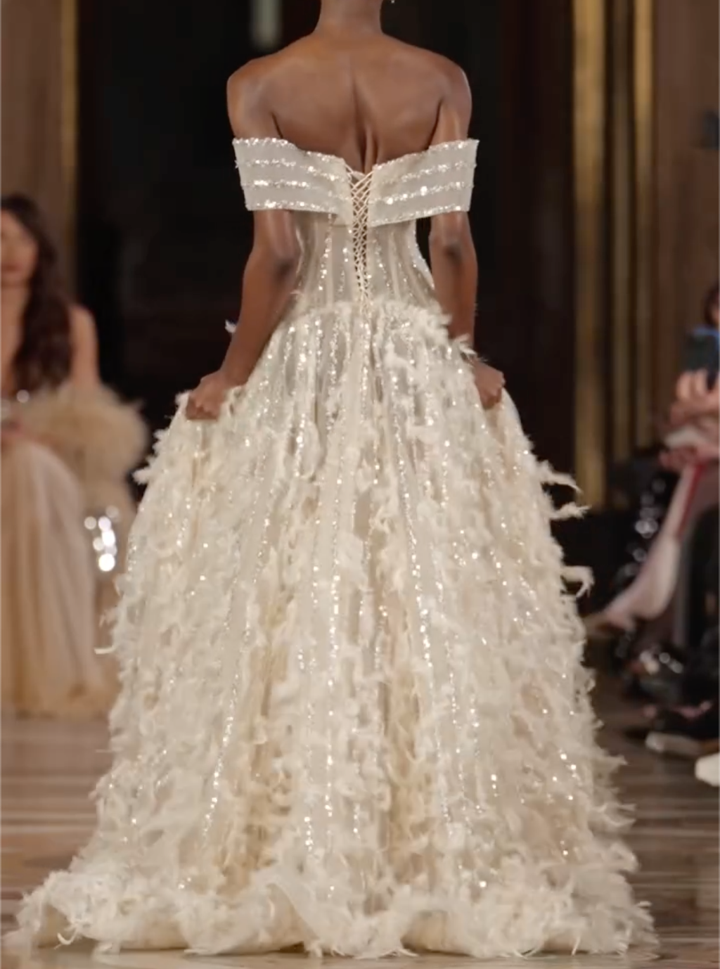 Off White Off Shoulder Rhinestone Bow Corset Feather Voluminous Tulle Train Wedding Ball Gown For Bride Gala Fashion Show Editorial Shoot