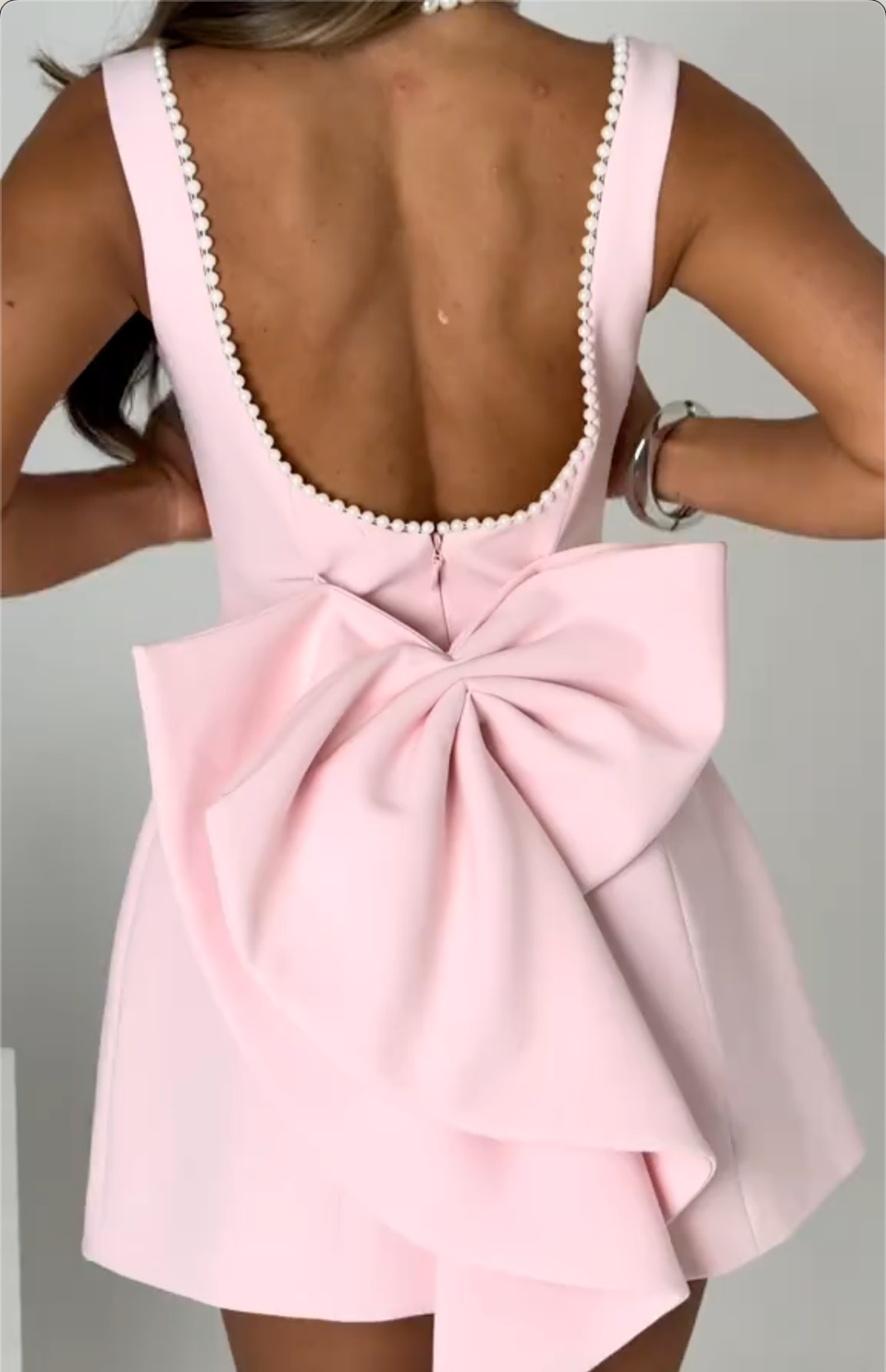 Blush Pink Open Back Party Dress with Pearl Trim & Giant Bow Detail