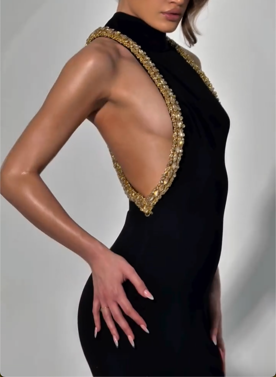Glamorous Black High-Neck Mermaid Maxi Dress with Gold Crystal Open-Back Detail